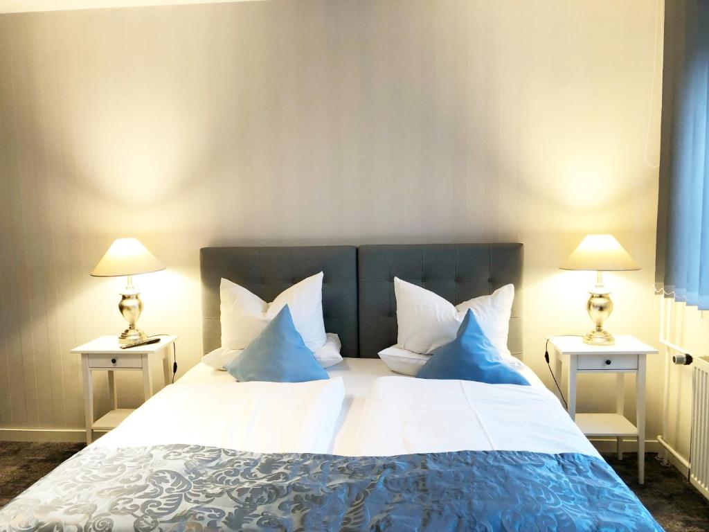 Postel nebo postele na pokoji v ubytování Hotel Kristall