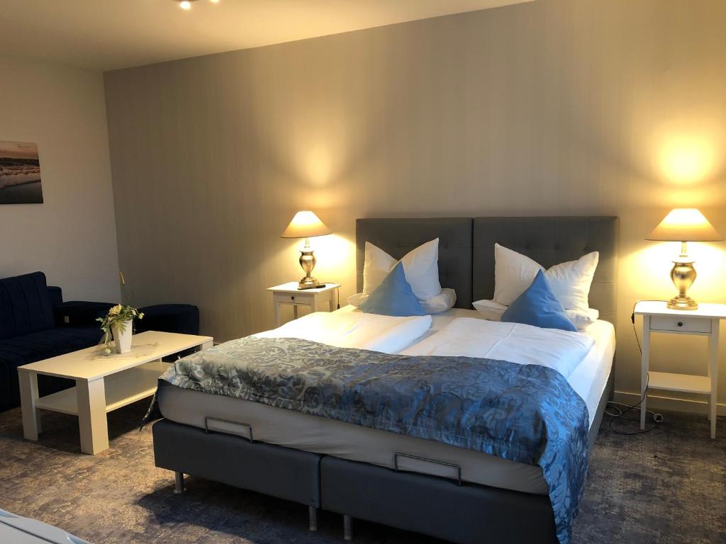 Postel nebo postele na pokoji v ubytování Hotel Kristall
