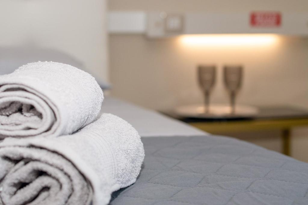 Postel nebo postele na pokoji v ubytování Diegohousesleepaway
