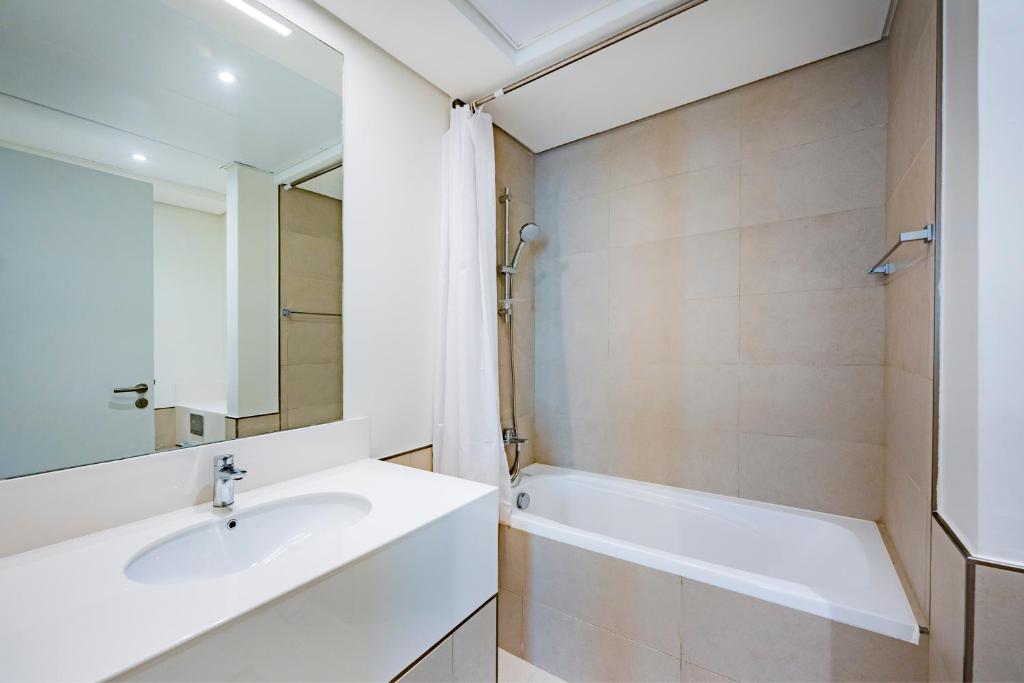 Koupelna v ubytování Expo Village Serviced Apartments
