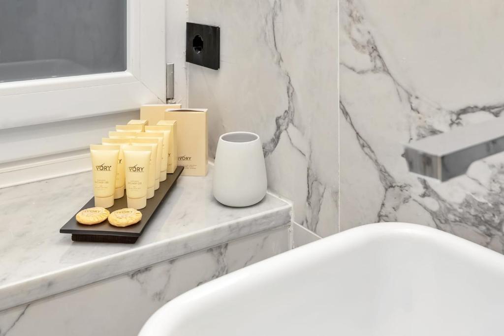 Kúpeľňa v ubytovaní Nelli Rooms Via Biassa