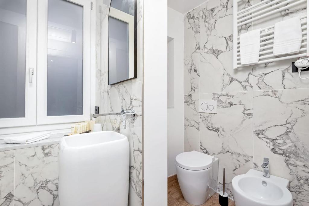 Kúpeľňa v ubytovaní Nelli Rooms Via Biassa