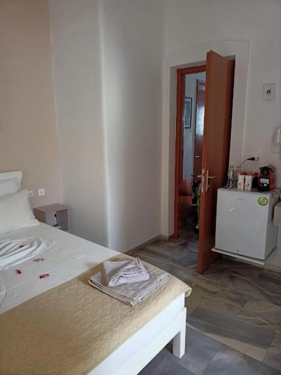 Postel nebo postele na pokoji v ubytování Marisa Rooms