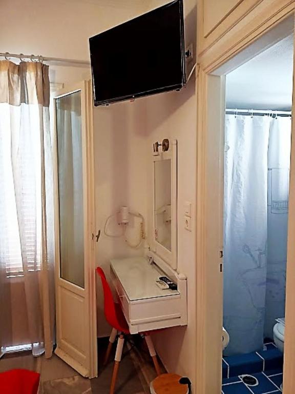 TV a/nebo společenská místnost v ubytování Marisa Rooms