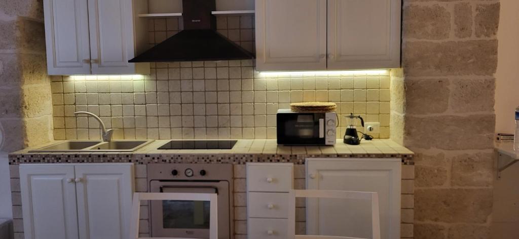 Kuchyň nebo kuchyňský kout v ubytování La casa di Sara