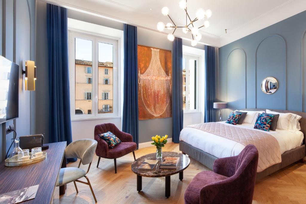 Una cama o camas en una habitación de Migliori Collection Piazza Navona