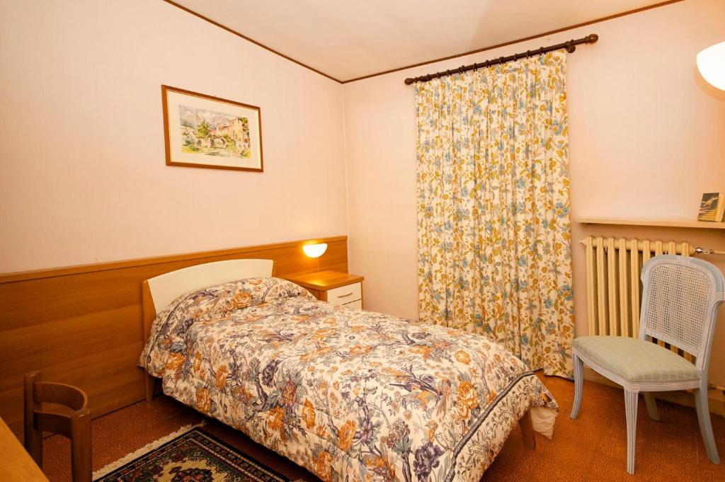 Postel nebo postele na pokoji v ubytování Albergo Ponte di Nava