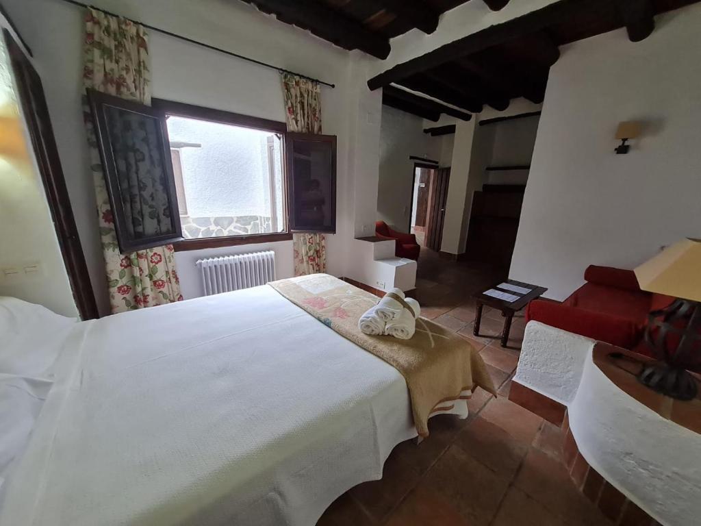 Postel nebo postele na pokoji v ubytování Hotel Apartamento Nueva Alcazaba