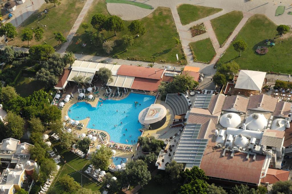 an overhead view of a pool at a resort at Belcekiz Beach Club - All Inclusive in Oludeniz
