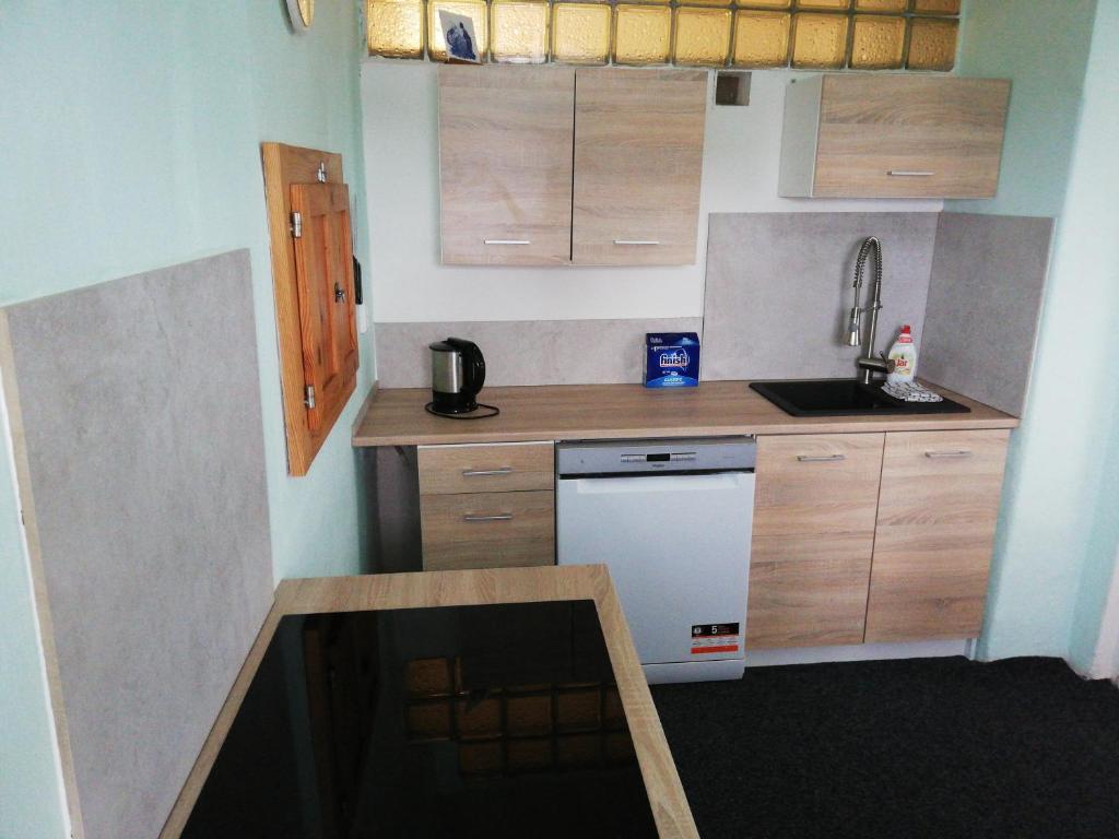 Kuchnia lub aneks kuchenny w obiekcie Apartmán Saxán Smržovka