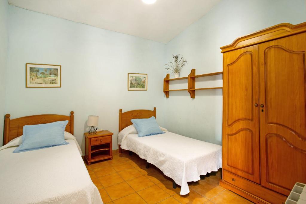 A bed or beds in a room at Finca Tropical