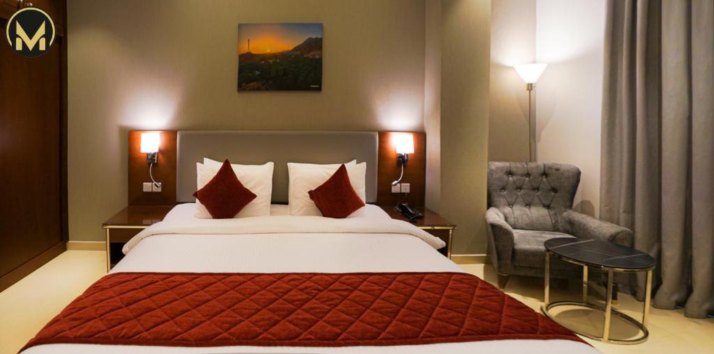 Postel nebo postele na pokoji v ubytování Muscat Express Hotel