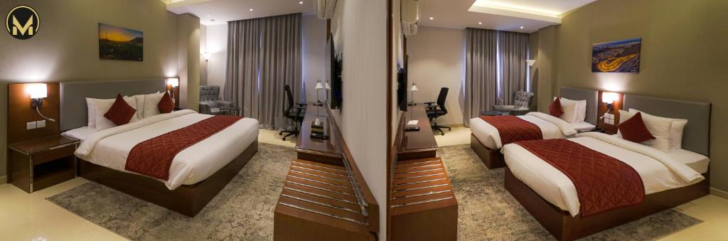 Postel nebo postele na pokoji v ubytování Muscat Express Hotel