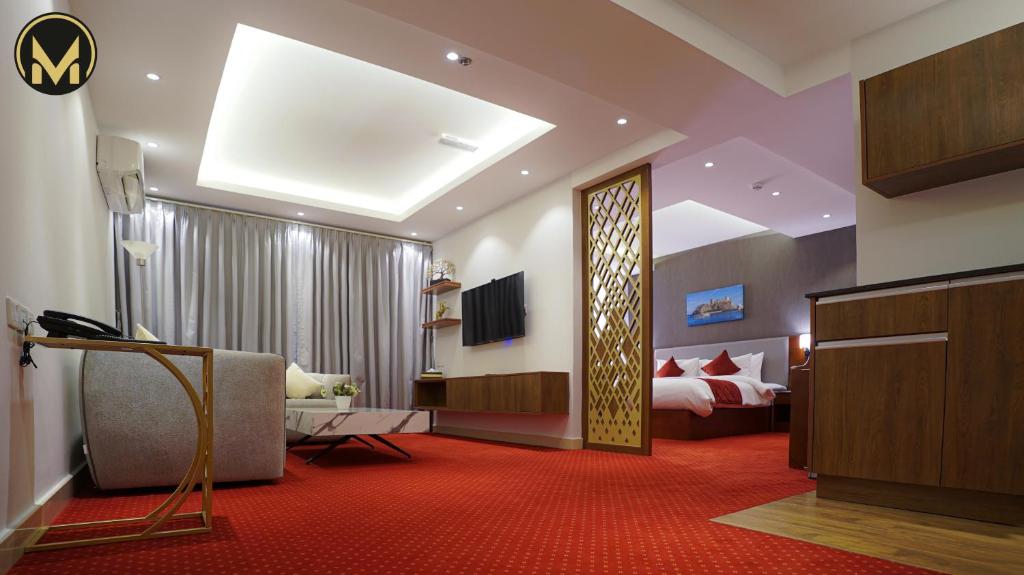 TV a/nebo společenská místnost v ubytování Muscat Express Hotel