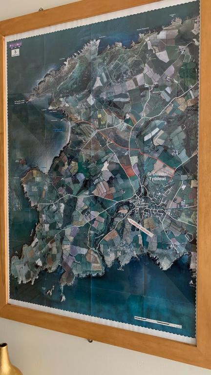 a map of a city on a wall at Ramsey House - Luxury Licensed B&B - Parking and Guest Lounge in St. Davids