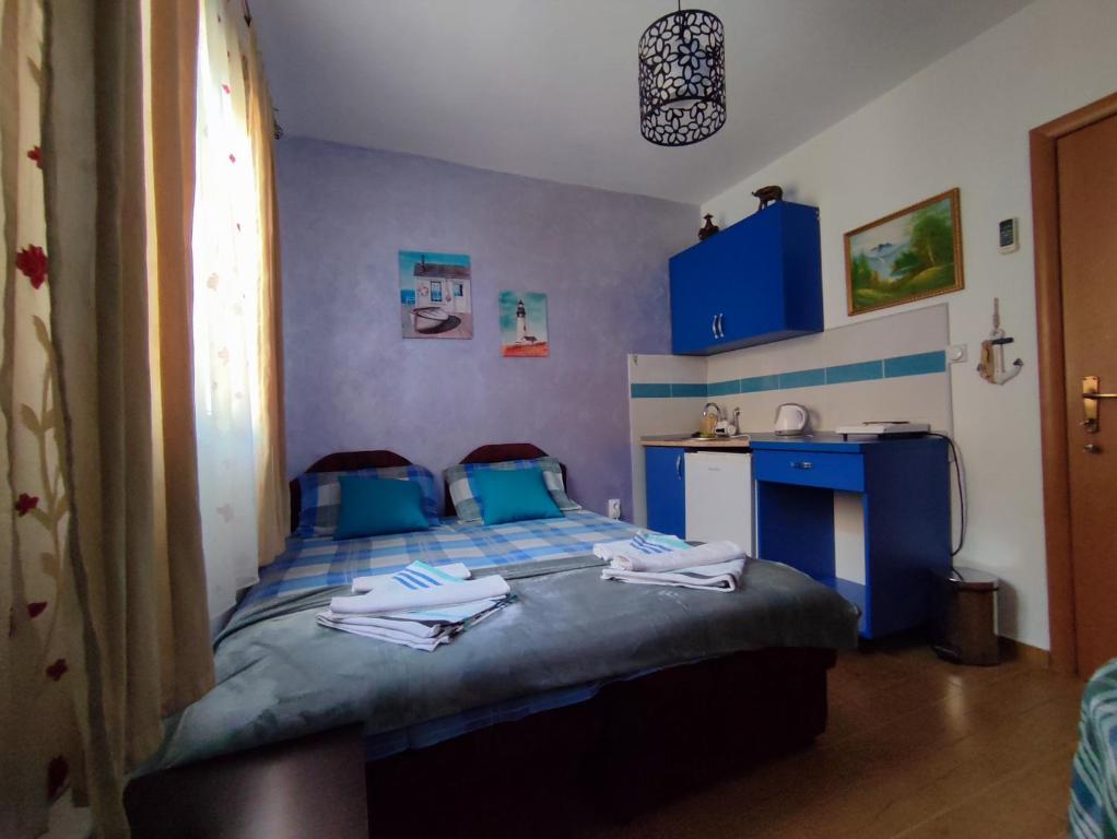 Postel nebo postele na pokoji v ubytování Apartments Blago Sutomore