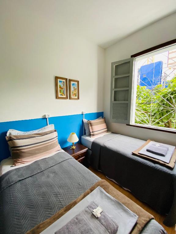 Postel nebo postele na pokoji v ubytování Rota BH Hostel