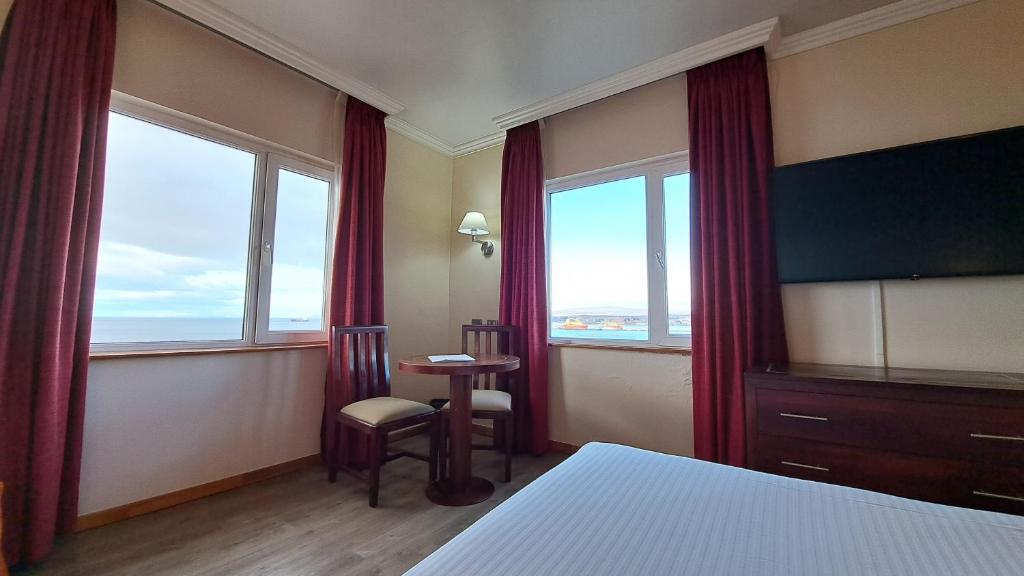TV a/nebo společenská místnost v ubytování Hotel Diego de Almagro Punta Arenas