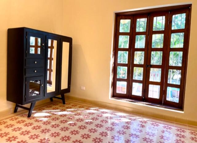 Postel nebo postele na pokoji v ubytování Gardenhotel Macan Ché B&B