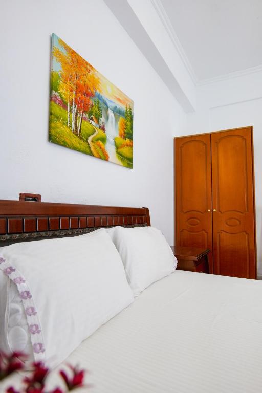 Postel nebo postele na pokoji v ubytování Guest House Gerard