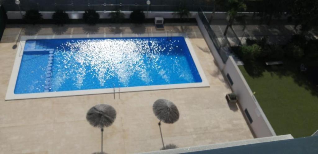Bazén v ubytování Apartamento DALÍ nebo v jeho okolí