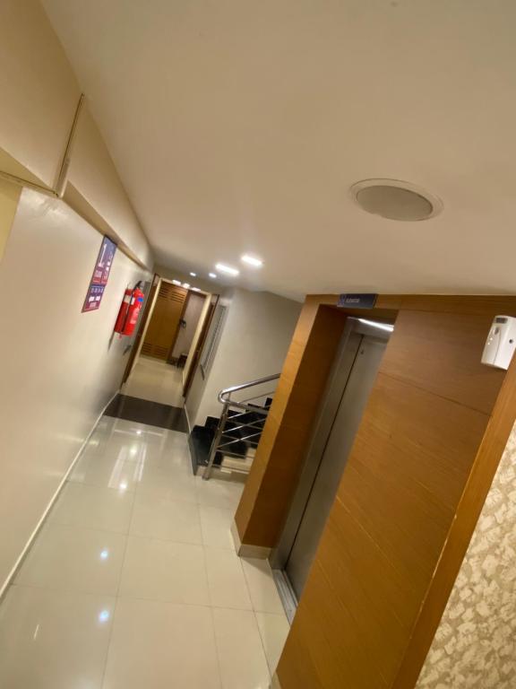 Kuchyň nebo kuchyňský kout v ubytování Greens Suite - Business Class Hotel - Opposite Ripon Building