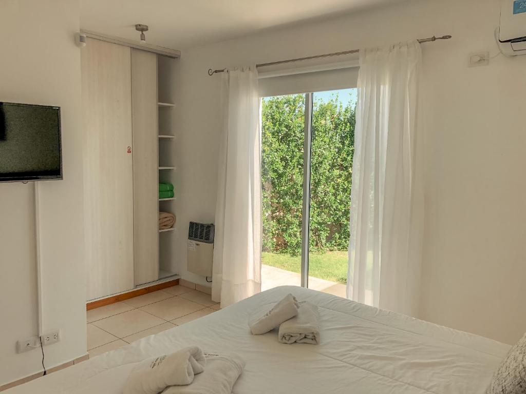 Postel nebo postele na pokoji v ubytování Good Life Resort