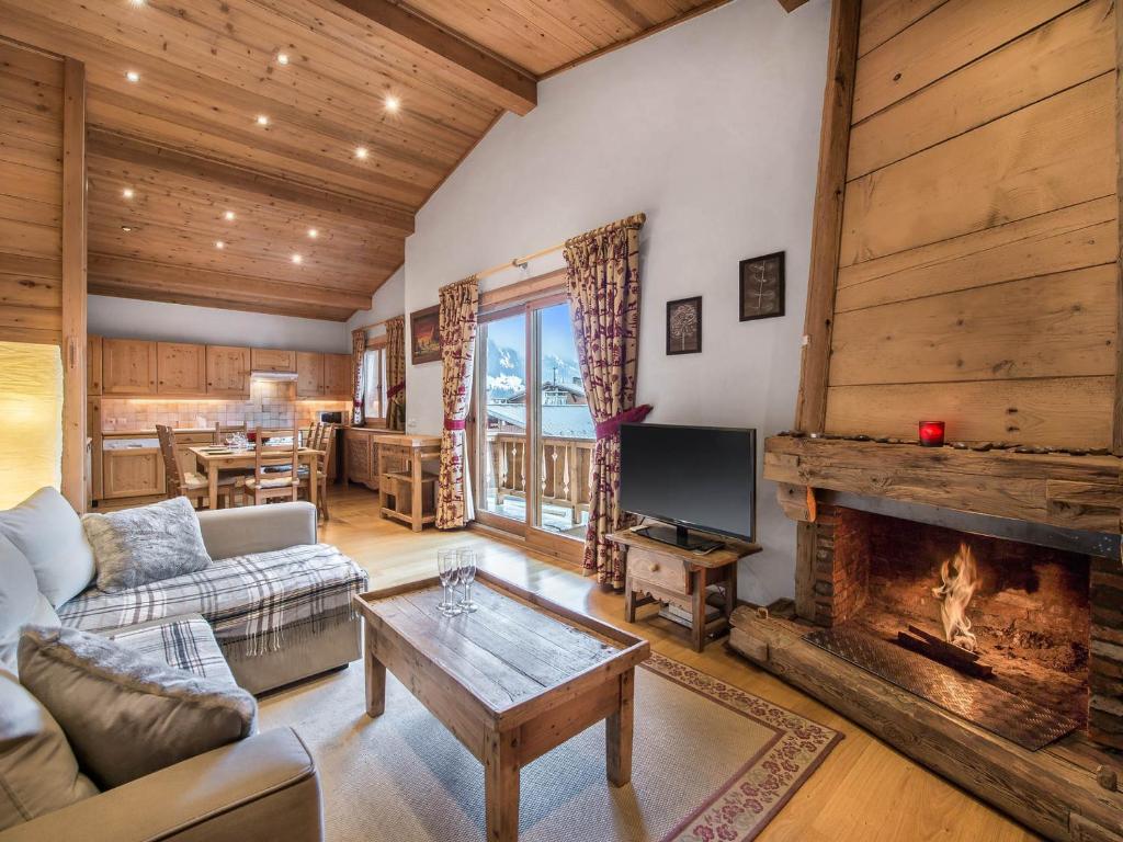 Appartement Megève, 4 pièces, 6 personnes - FR-1-453-6にあるシーティングエリア