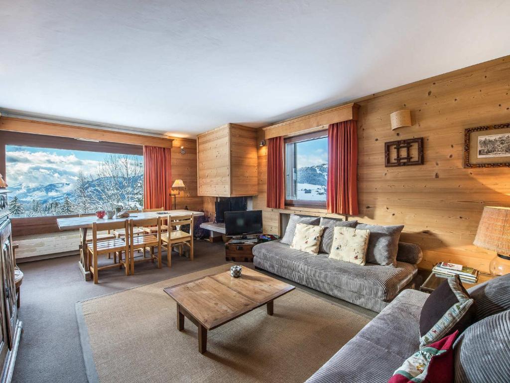 Appartement Megève, 3 pièces, 6 personnes - FR-1-453-32にあるシーティングエリア