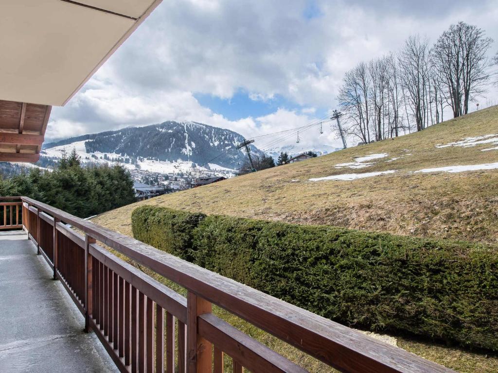 a porch with a view of a snow covered mountain at Appartement Megève, 2 pièces, 4 personnes - FR-1-453-51 in Megève