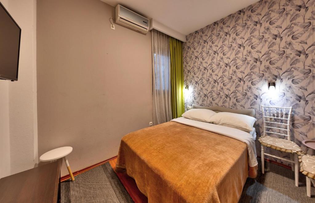 Postel nebo postele na pokoji v ubytování Pansion Villa Nur