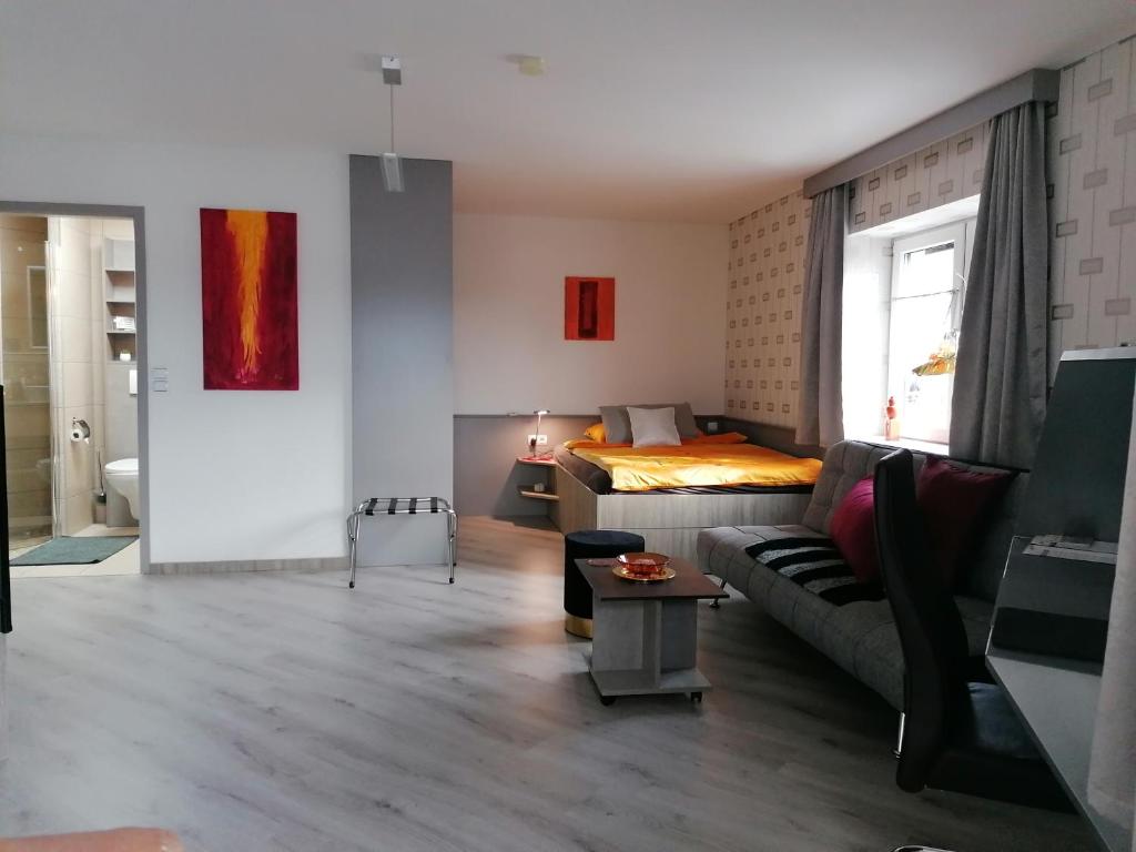 Posedenie v ubytovaní Business Apartments