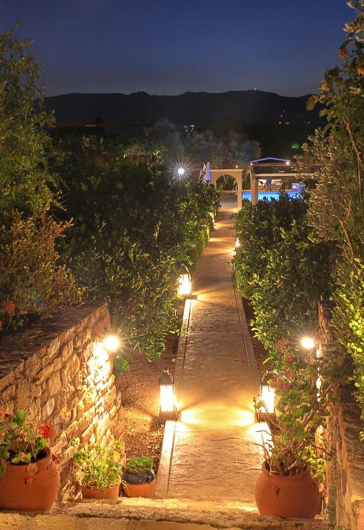 A garden outside Venetis Luxury Apartments