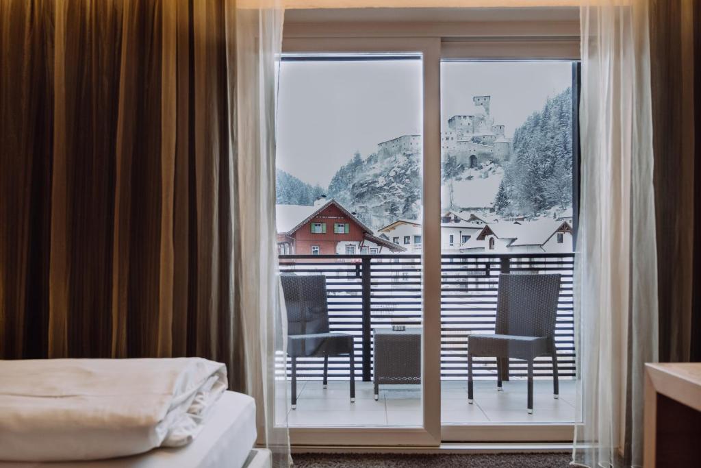 Letto o letti in una camera di Hotel Heini