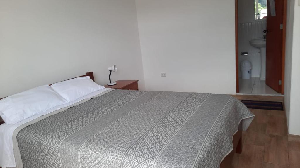Postel nebo postele na pokoji v ubytování Hospedaje Margarita