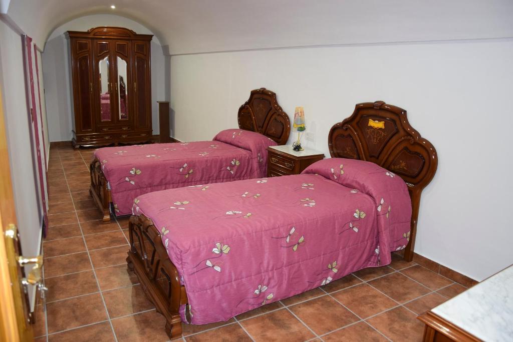 Posteľ alebo postele v izbe v ubytovaní Cueva Rural Las Palmeras