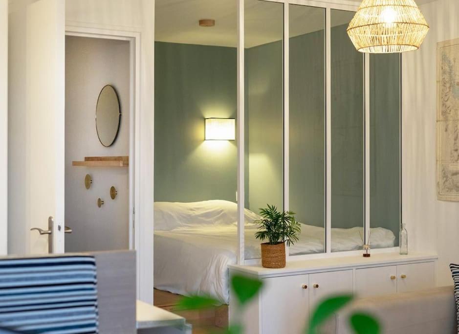 Posteľ alebo postele v izbe v ubytovaní Appartement vue sur mer, 100 m de la plage