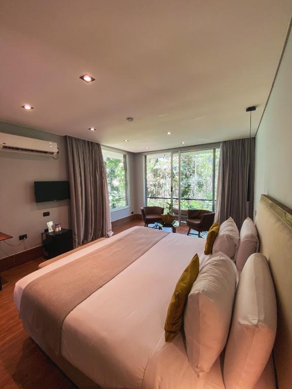 Postel nebo postele na pokoji v ubytování Selvaje Lodge Iguazu