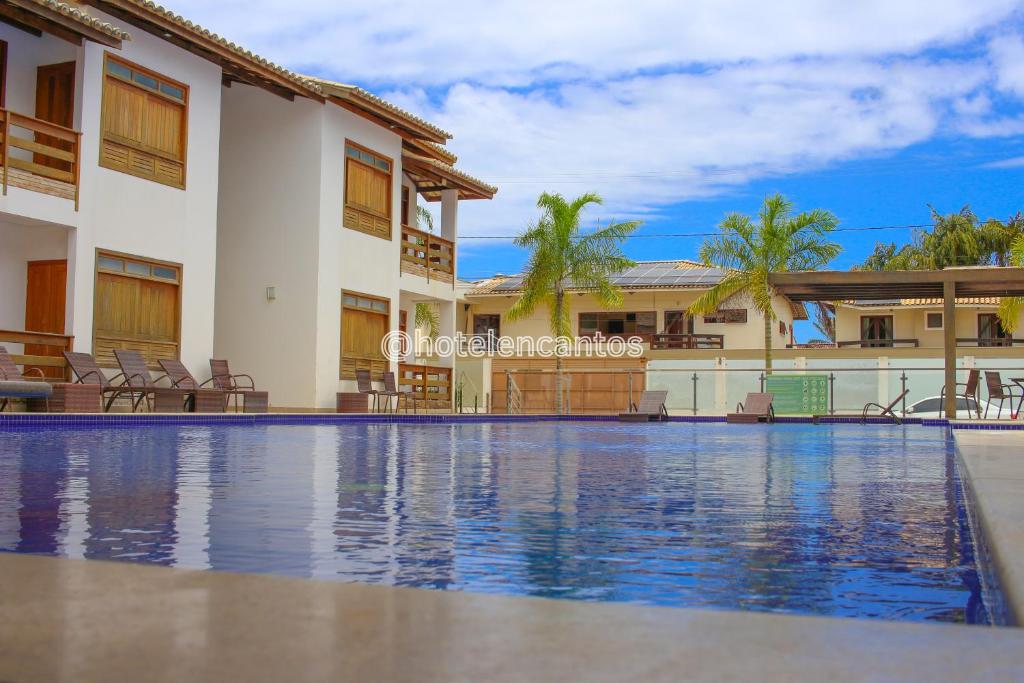 Bazén v ubytování Hotel Encantos de Itaperapuã nebo v jeho okolí
