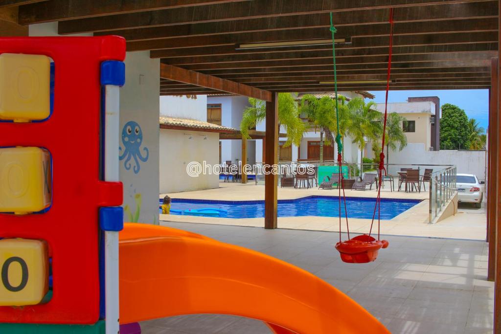 Bazén v ubytování Hotel Encantos de Itaperapuã nebo v jeho okolí
