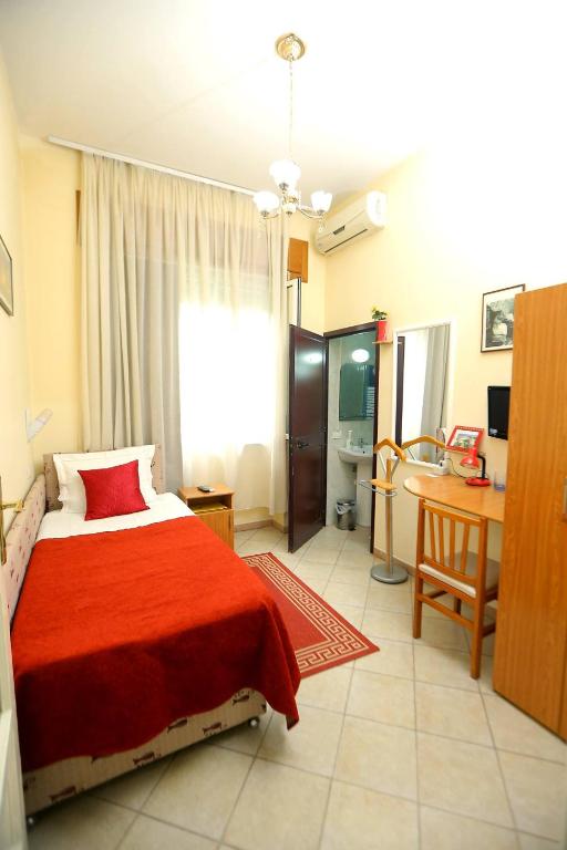 Llit o llits en una habitació de Hotel Kaduku