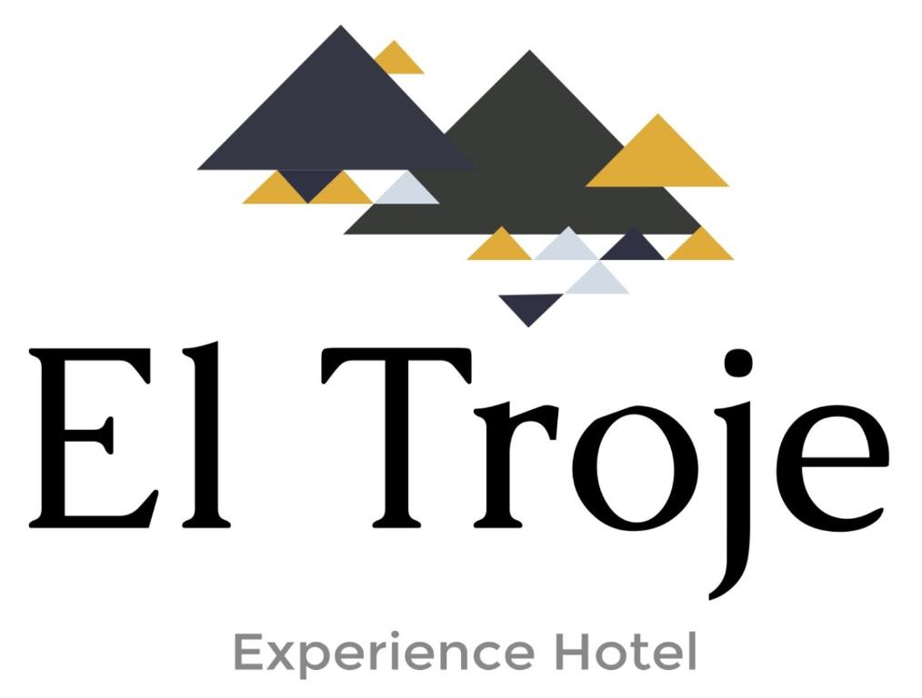una imagen del logotipo del hotel Experiencia El fiore en Hostería El Troje Experience, en Riobamba