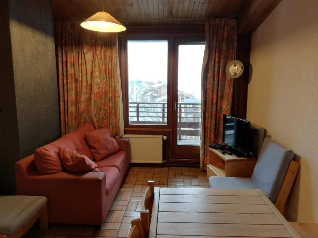 Appartement Tignes, 5 pièces, 10 personnes - FR-1-449-62にあるシーティングエリア