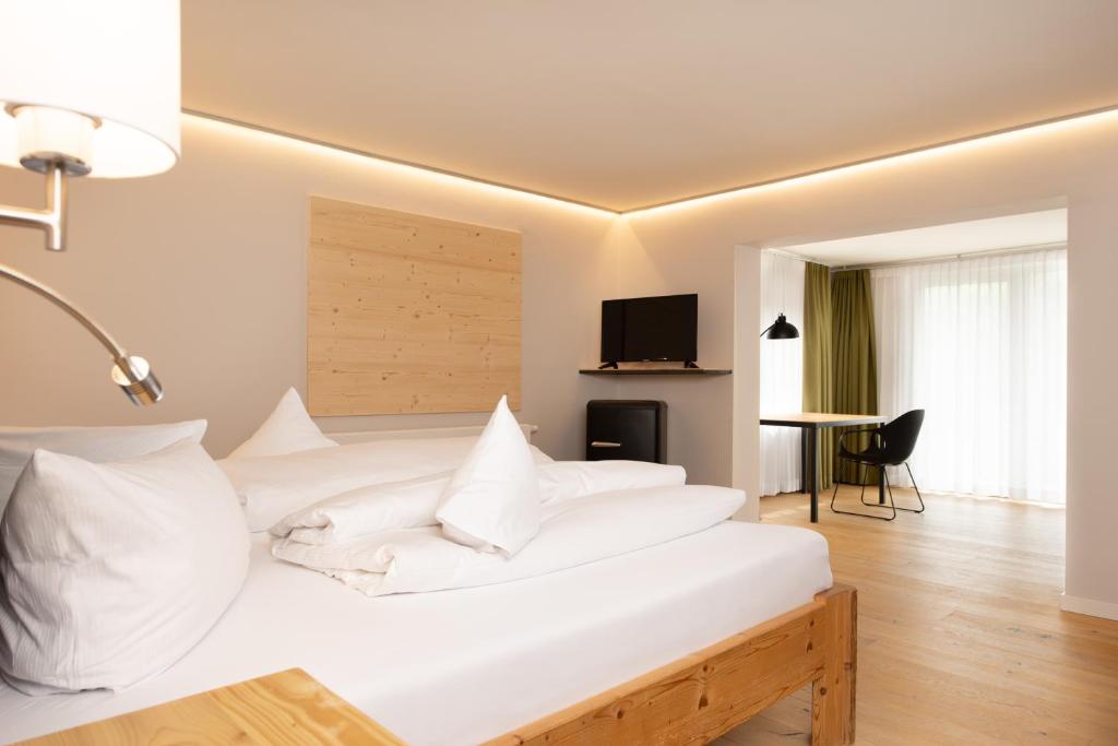 Postel nebo postele na pokoji v ubytování freistil Boutiquehotel