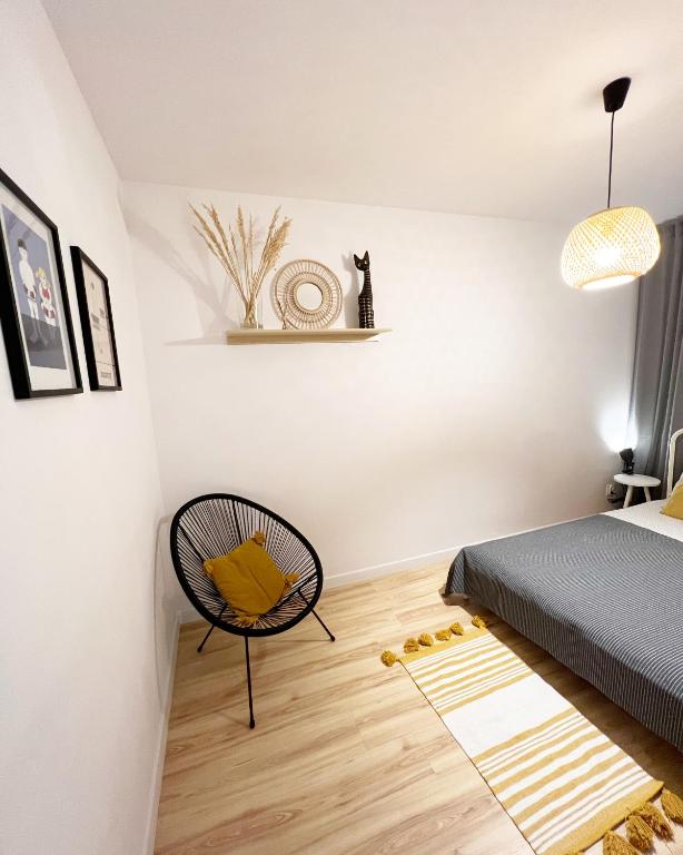 Posteľ alebo postele v izbe v ubytovaní Warszawska 1 Apartament Giżycko
