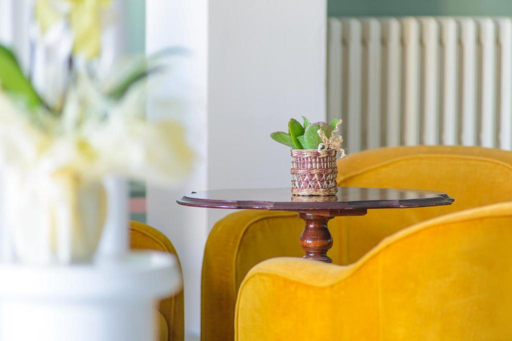 A seating area at Palace Hotel Domus Mea Riccione