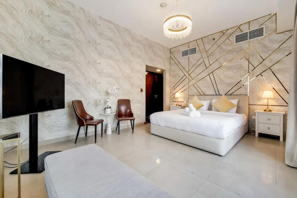 Postel nebo postele na pokoji v ubytování Vacationer I Sparkle 1 Bedroom I Marina Views I Steps away from Beach I Gym, Pool, Parking & Wi-Fi