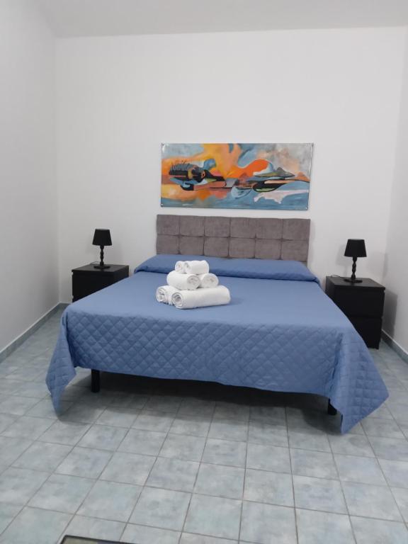 A bed or beds in a room at Villa Lucia