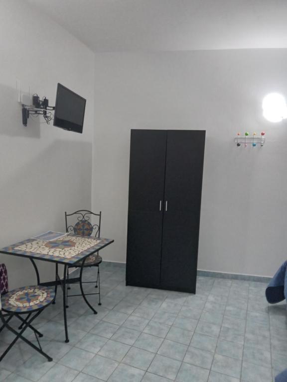 A television and/or entertainment centre at Villa Lucia