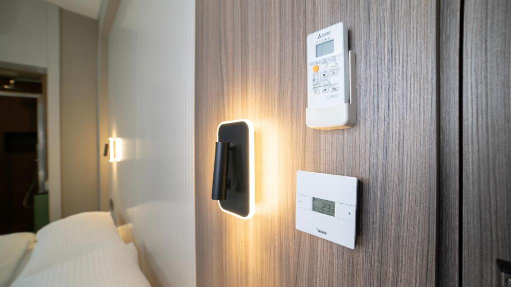Postel nebo postele na pokoji v ubytování Vesta Rooms